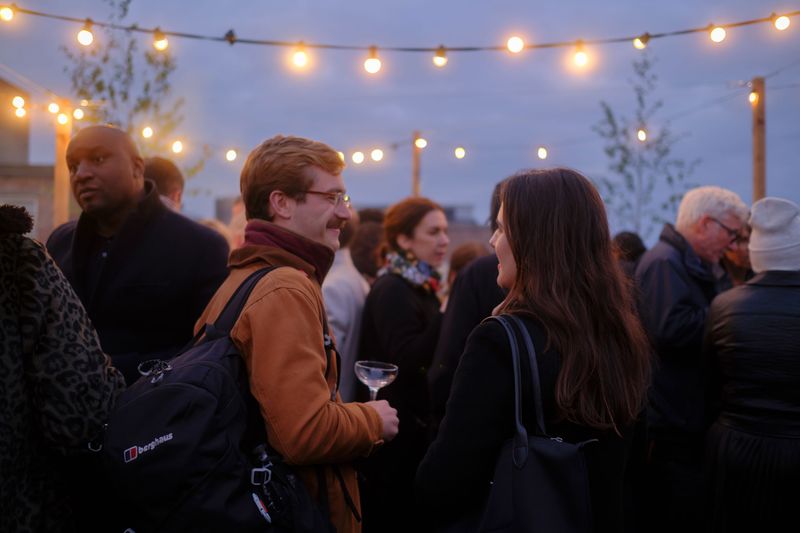 Guests on roofterrace during Queensrollahouse artist studio LDF Party
